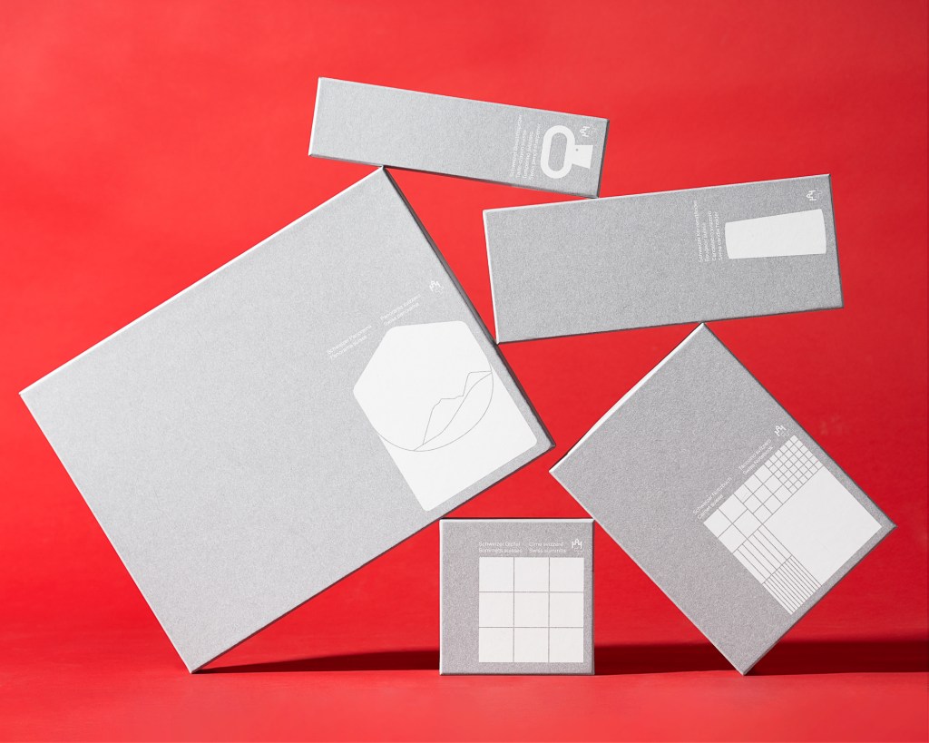 objects on a red background photography by Marvin Merkel